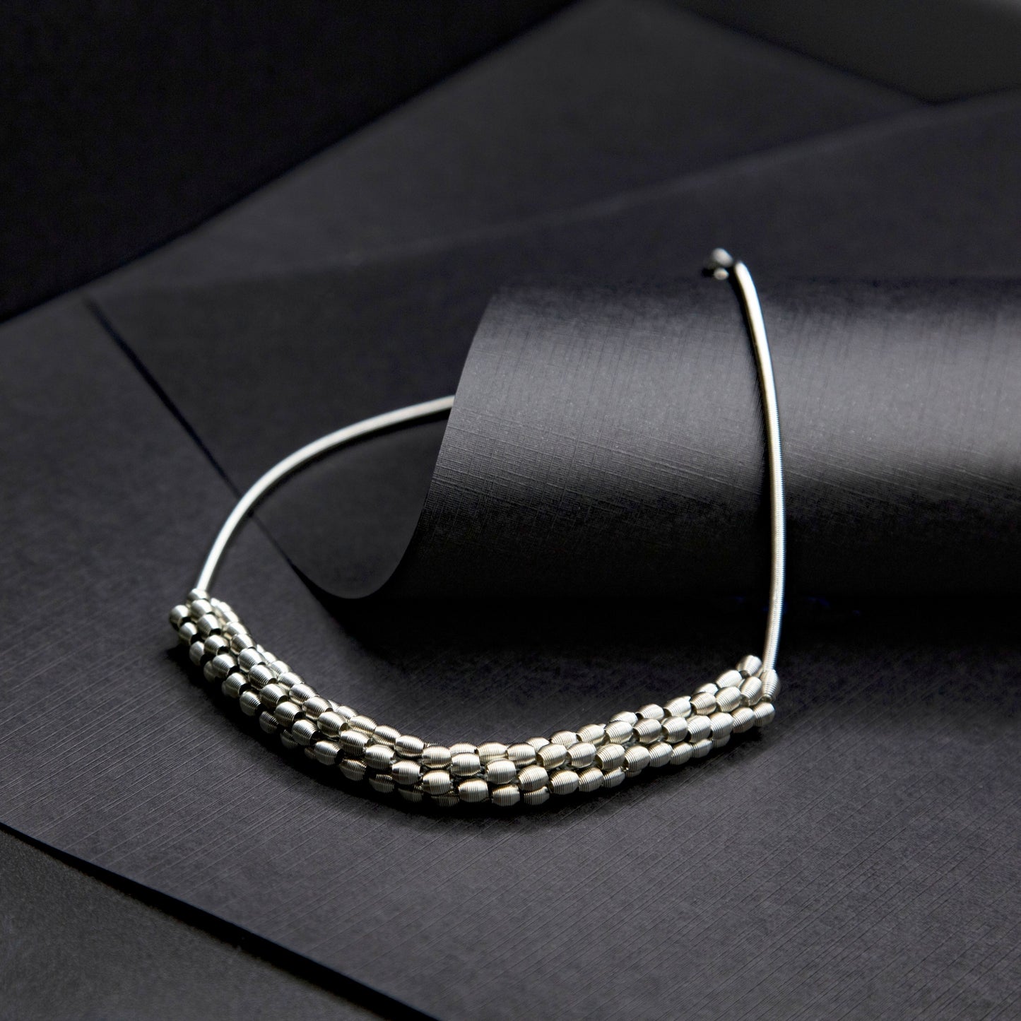 Short Silver Piano Wire Necklace with Woven Silver Beads